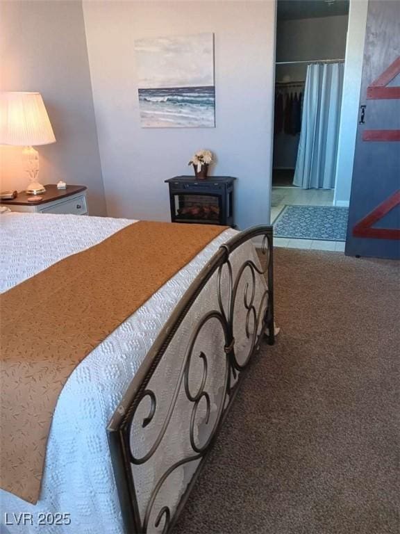 3862 E Summit Ave, Pahrump, NV 89061 - bedroom featuring carpet, a spacious closet, and a closet