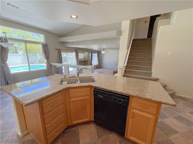 1564 Silver Knoll Ave, Las Vegas, NV 89123 - kitchen with black dishwasher, a sink, lofted ceiling, plenty of natural light, and a ceiling fan