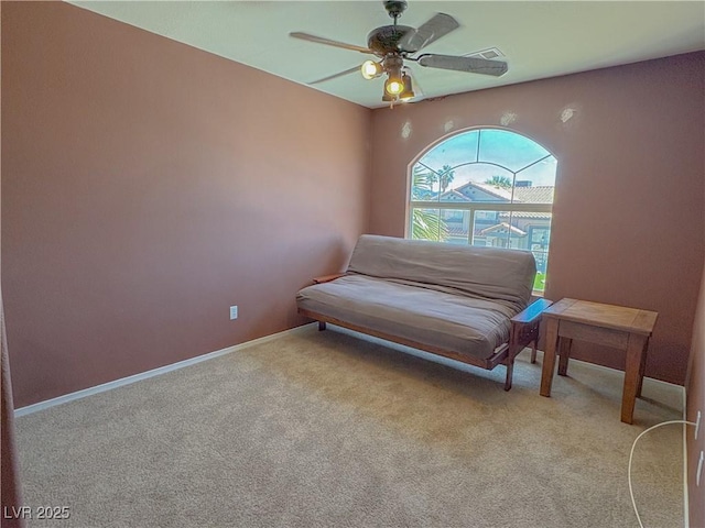 1564 Silver Knoll Ave, Las Vegas, NV 89123 - living area with a ceiling fan, light carpet, and baseboards