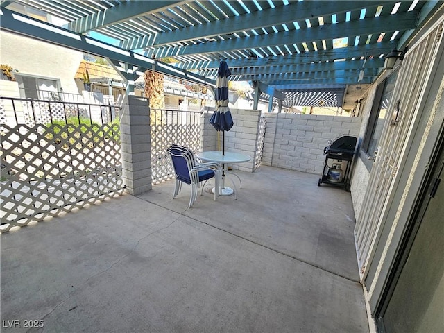 1128 Willow Tree Dr Unit C, Las Vegas, NV 89128 - fenced backyard with a grill, outdoor dining area, a pergola, and a patio