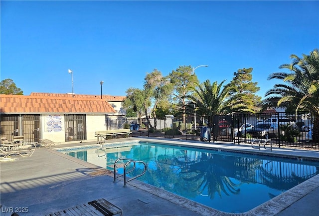 1128 Willow Tree Dr Unit C, Las Vegas, NV 89128 - community pool with a patio