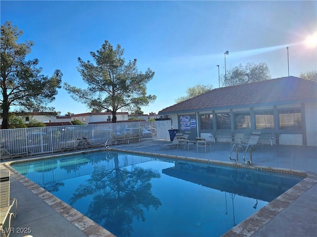 1128 Willow Tree Dr Unit C, Las Vegas, NV 89128 - community pool featuring a patio area