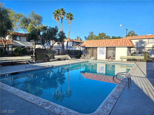 1128 Willow Tree Dr Unit C, Las Vegas, NV 89128 - community pool with a patio