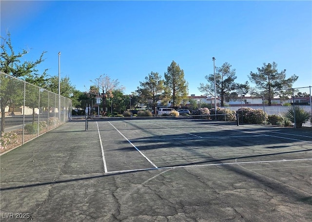 1128 Willow Tree Dr Unit C, Las Vegas, NV 89128 - view of tennis court featuring fence