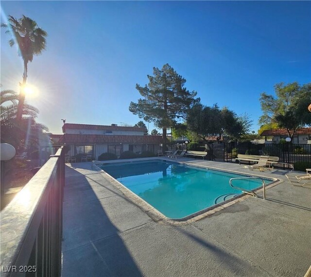 1128 Willow Tree Dr Unit C, Las Vegas, NV 89128 - community pool with a patio area