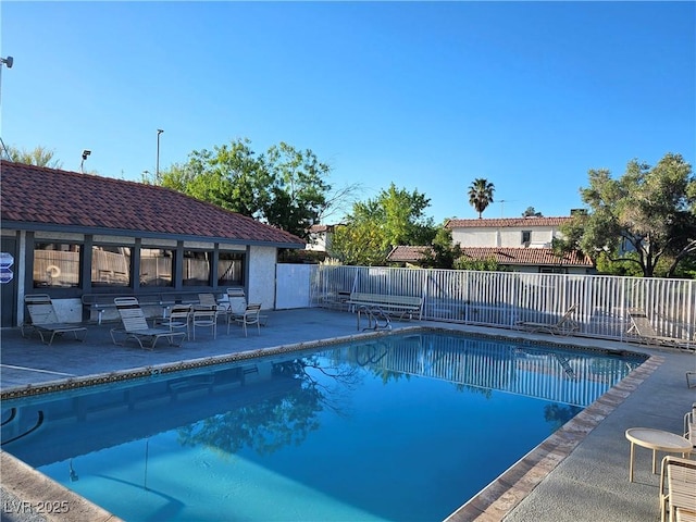 1128 Willow Tree Dr Unit C, Las Vegas, NV 89128 - community pool featuring a patio