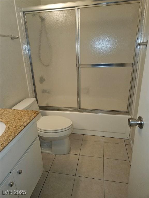 1128 Willow Tree Dr Unit C, Las Vegas, NV 89128 - bathroom featuring vanity, tile patterned flooring, and enclosed tub / shower combo