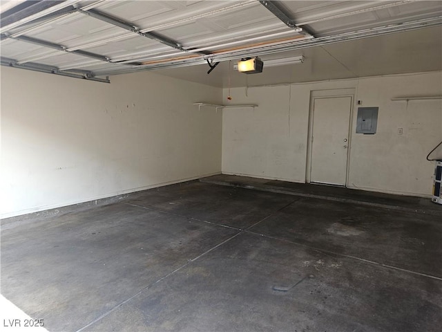 1128 Willow Tree Dr Unit C, Las Vegas, NV 89128 - garage featuring electric panel and a garage door opener