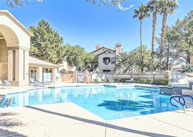 5415 W Harmon Ave Unit 2094, Las Vegas, NV 89103 - community pool featuring fence and a patio