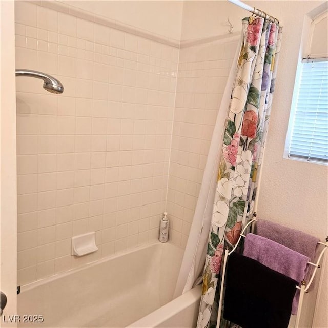 5415 W Harmon Ave Unit 2094, Las Vegas, NV 89103 - bathroom featuring shower / bath combo with shower curtain