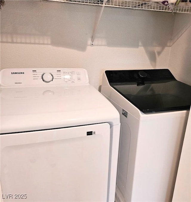 5415 W Harmon Ave Unit 2094, Las Vegas, NV 89103 - laundry room featuring washer and clothes dryer