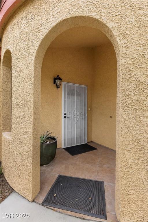 4185 W Arby Ave, Las Vegas, NV 89118 - entrance to property with stucco siding