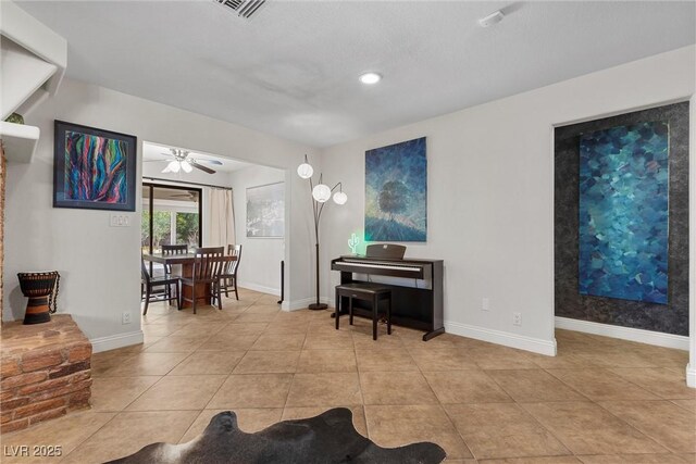 4185 W Arby Ave, Las Vegas, NV 89118 - living area with a ceiling fan, light tile patterned floors, baseboards, and recessed lighting