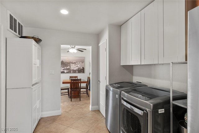 4185 W Arby Ave, Las Vegas, NV 89118 - laundry room with cabinet space, washing machine and dryer, ceiling fan, light tile patterned floors, and recessed lighting