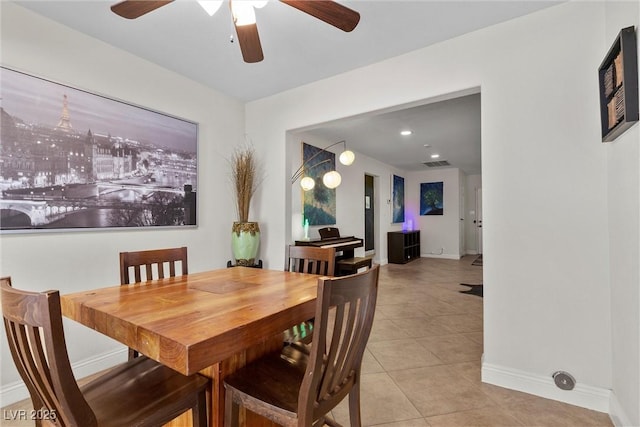 4185 W Arby Ave, Las Vegas, NV 89118 - dining room with light tile patterned floors, baseboards, and a ceiling fan