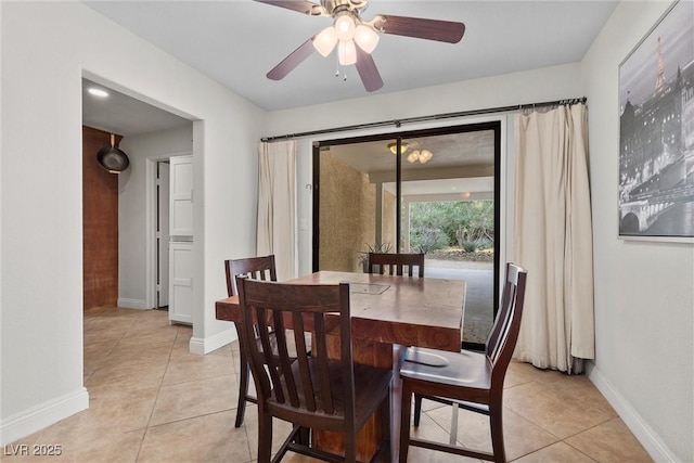 4185 W Arby Ave, Las Vegas, NV 89118 - dining room featuring light tile patterned floors, a ceiling fan, and baseboards