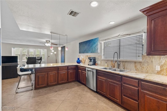 4185 W Arby Ave, Las Vegas, NV 89118 - kitchen with stainless steel dishwasher, a sink, a peninsula, tasteful backsplash, and an office area