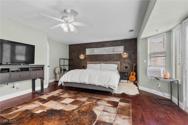 4185 W Arby Ave, Las Vegas, NV 89118 - bedroom with an accent wall, wood finished floors, baseboards, and cooling unit
