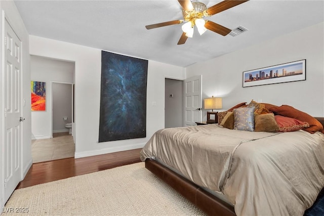 4185 W Arby Ave, Las Vegas, NV 89118 - bedroom featuring wood finished floors, baseboards, and a ceiling fan