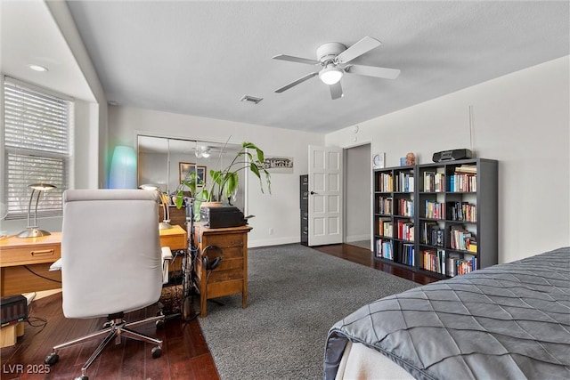 4185 W Arby Ave, Las Vegas, NV 89118 - bedroom with wood finished floors and a desk