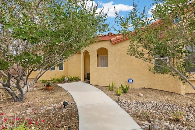 4185 W Arby Ave, Las Vegas, NV 89118 - entrance to property with stucco siding and a tile roof