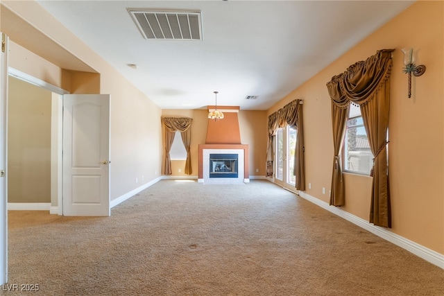 395 Suzanne Peak Ct, Henderson, NV 89012 - unfurnished living room with carpet floors and a tile fireplace