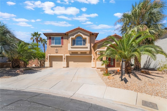 395 Suzanne Peak Ct, Henderson, NV 89012 - mediterranean / spanish home featuring an attached garage, stucco siding, driveway, and a tiled roof