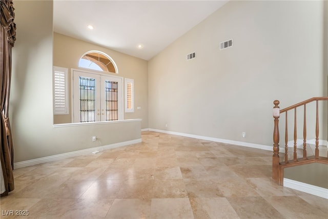 395 Suzanne Peak Ct, Henderson, NV 89012 - empty room featuring high vaulted ceiling and stairs