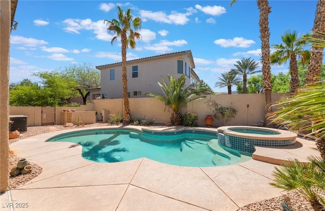 395 Suzanne Peak Ct, Henderson, NV 89012 - view of swimming pool featuring a fenced backyard, a pool with connected hot tub, and a patio