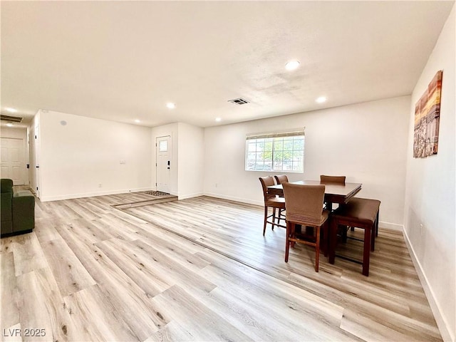 4881 E Imperial Ave, Las Vegas, NV 89104 - dining space featuring recessed lighting, light wood finished floors, and baseboards