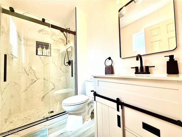 4881 E Imperial Ave, Las Vegas, NV 89104 - full bathroom featuring toilet, vanity, and a marble finish shower