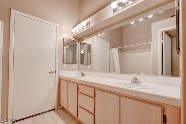 5000 Red Rock St Unit 237, Las Vegas, NV 89118 - bathroom featuring tile patterned floors and double vanity