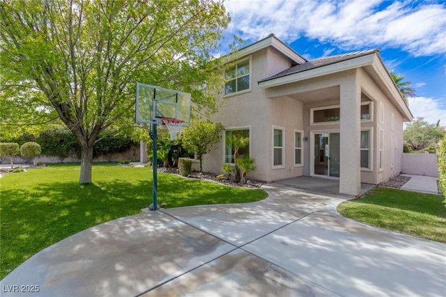 10761 Capesthorne Way, Las Vegas, NV 89135 - rear view of property featuring stucco siding and a patio