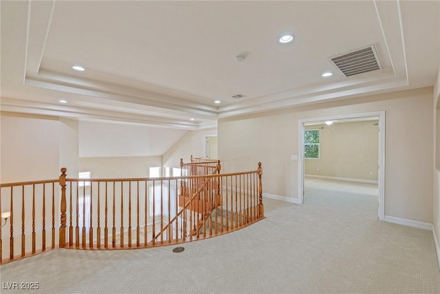 10761 Capesthorne Way, Las Vegas, NV 89135 - hall featuring an upstairs landing, a raised ceiling, recessed lighting, carpet floors, and baseboards