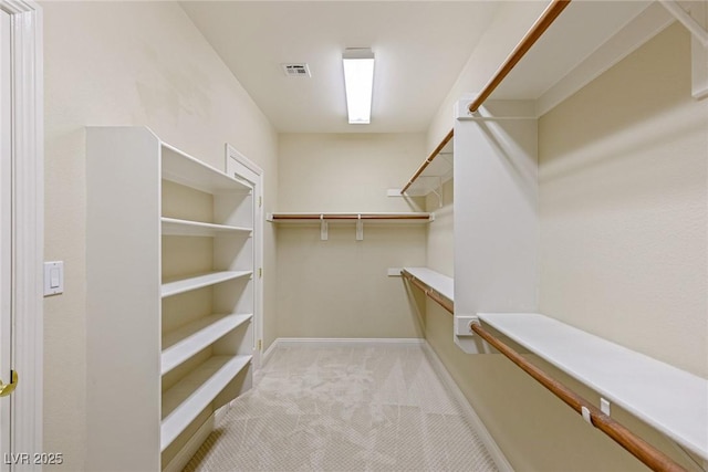 10761 Capesthorne Way, Las Vegas, NV 89135 - walk in closet featuring light colored carpet