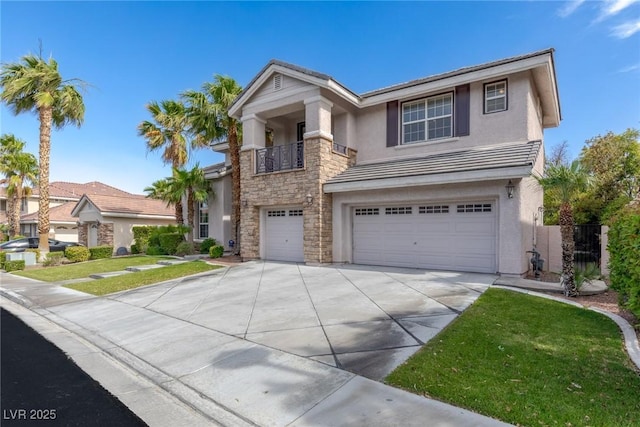 10761 Capesthorne Way, Las Vegas, NV 89135 - view of front facade featuring stucco siding, a garage, stone siding, concrete driveway, and a balcony