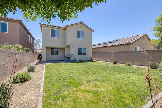 4050 Midnight Crest Ave, North Las Vegas, NV 89031 - rear view of house featuring stucco siding and a tiled roof
