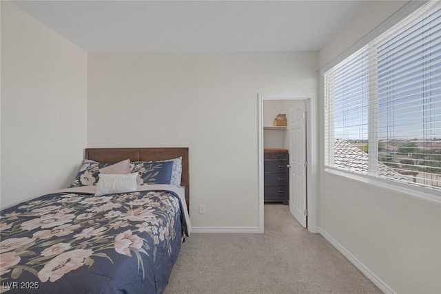 4050 Midnight Crest Ave, North Las Vegas, NV 89031 - carpeted bedroom featuring a spacious closet, baseboards, and a closet