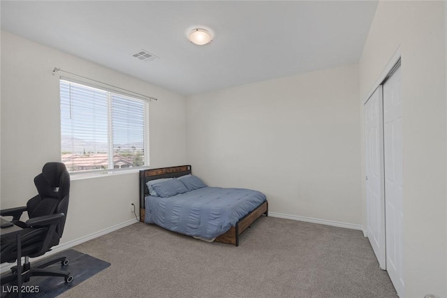 4050 Midnight Crest Ave, North Las Vegas, NV 89031 - bedroom with carpet, an office area, a closet, and baseboards