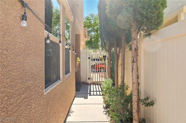 5380 Flowing Spring St, Las Vegas, NV 89122 - view of patio / terrace featuring a gate