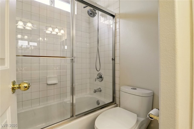 5380 Flowing Spring St, Las Vegas, NV 89122 - full bathroom with bath / shower combo with glass door and toilet