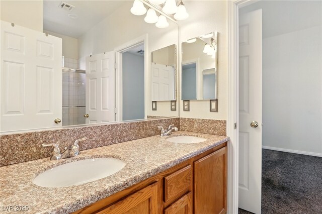 5380 Flowing Spring St, Las Vegas, NV 89122 - full bath with a tile shower and double vanity