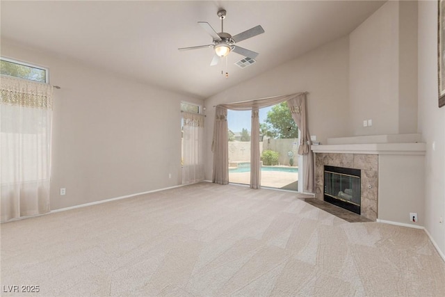 8266 Lincoln Valley St, Las Vegas, NV 89123 - unfurnished living room with ceiling fan, a fireplace, carpet, baseboards, and high vaulted ceiling