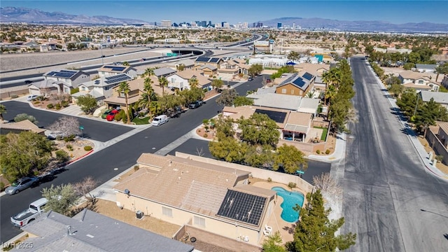 8266 Lincoln Valley St, Las Vegas, NV 89123 - aerial perspective of suburban area with mountains and a pool area