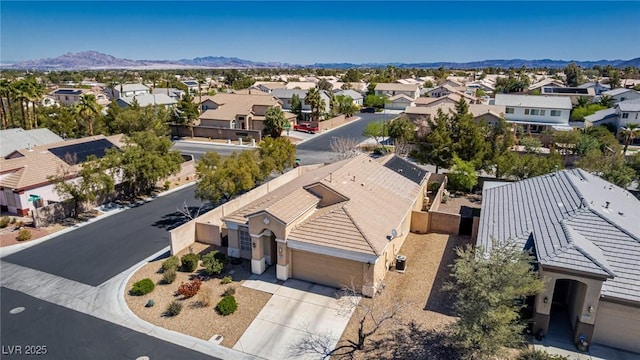 8266 Lincoln Valley St, Las Vegas, NV 89123 - aerial perspective of suburban area with mountains
