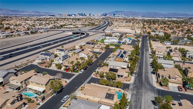 8266 Lincoln Valley St, Las Vegas, NV 89123 - aerial overview of property's location with nearby suburban area and mountains