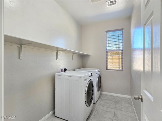 701 Monroe Hill Pl, Henderson, NV 89011 - washroom featuring washer and dryer, baseboards, and light tile patterned flooring