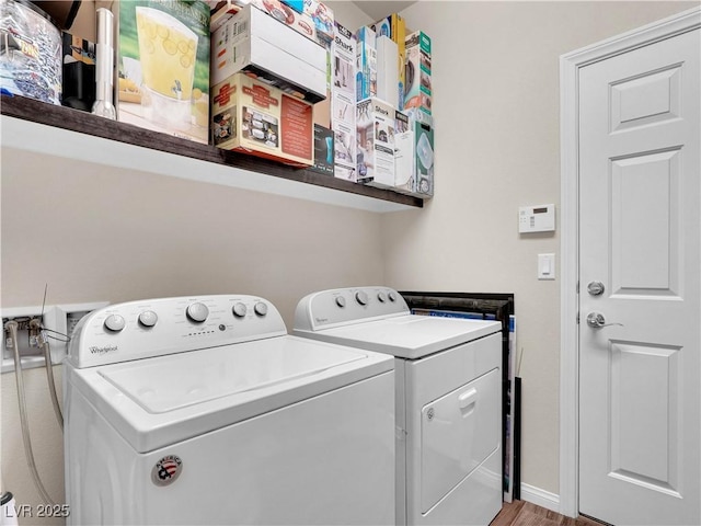 6465 Grande River Ct, Las Vegas, NV 89139 - washroom with independent washer and dryer and wood finished floors