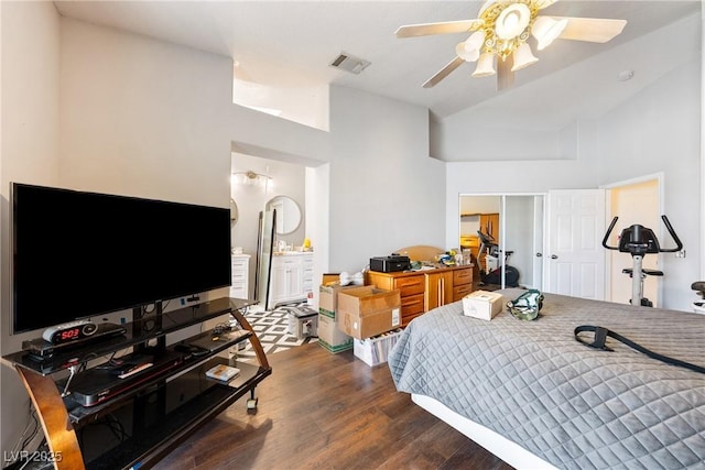 3481 Winery Rd, Pahrump, NV 89048 - bedroom with dark wood-style floors, high vaulted ceiling, a closet, ceiling fan, and ensuite bathroom