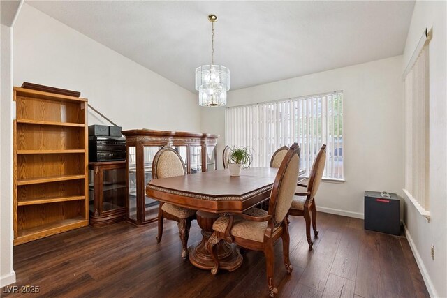 3481 Winery Rd, Pahrump, NV 89048 - dining room featuring baseboards, dark wood-style flooring, and a chandelier